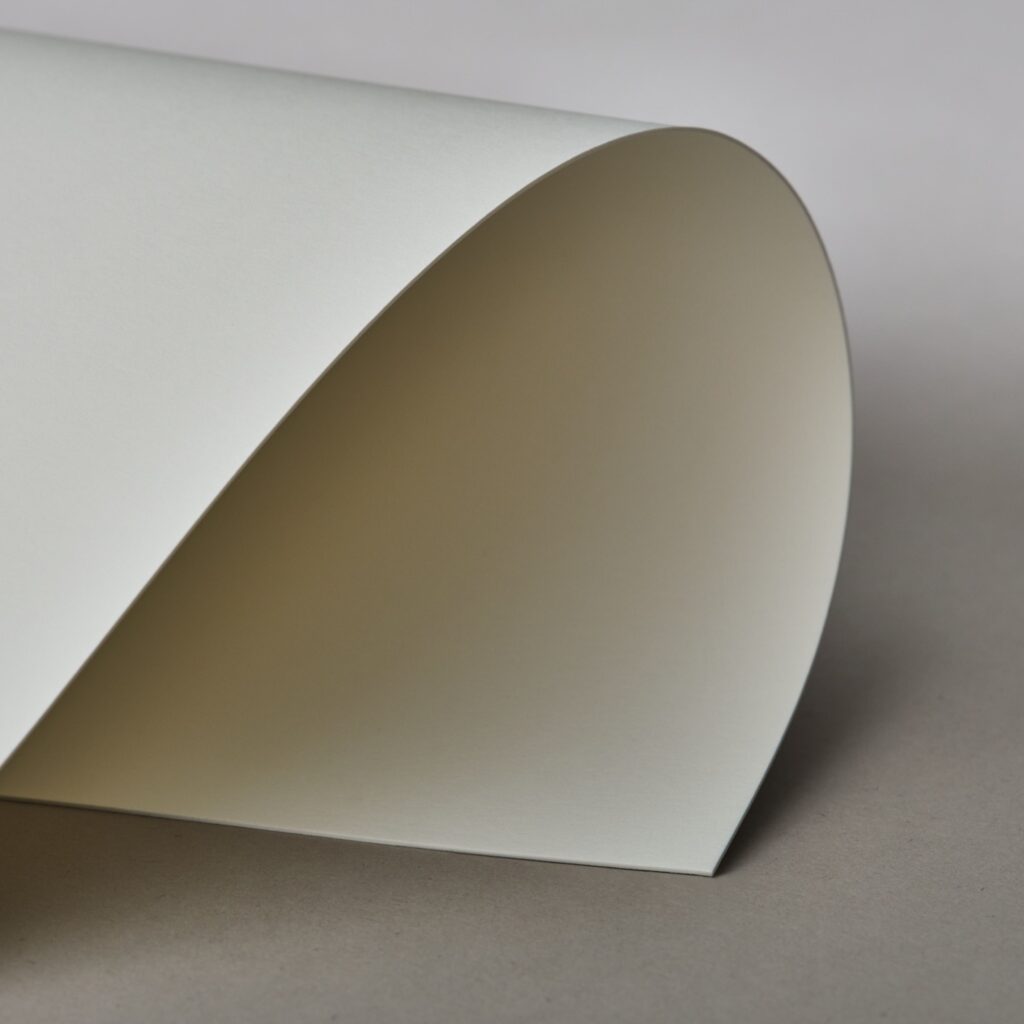 Close up shot of the Cream paper stock 