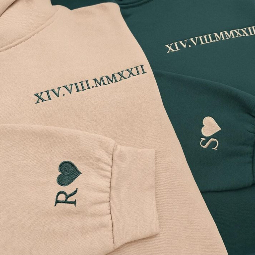 matching cream and beige hoodies with date of wedding and initial sewn on cuff 