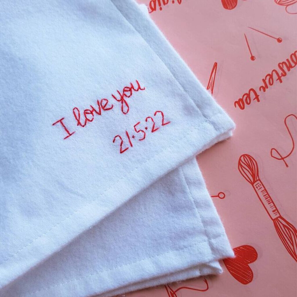 embroidered cotton handkerchief saying " i love you" and date of wedding